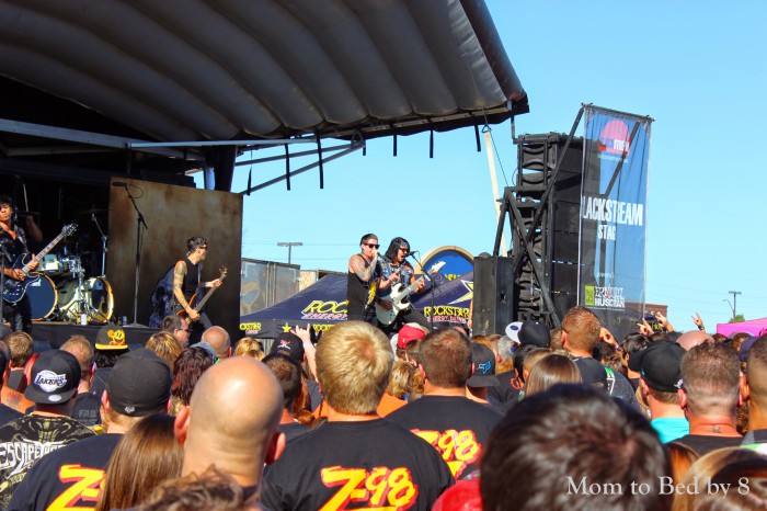 Escape the Fate performing in front of a full crowd.